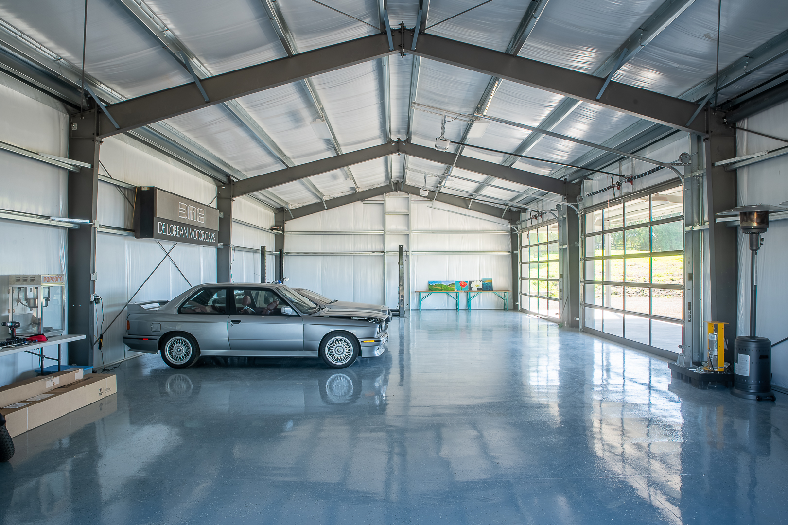 Garage with glass roll-up doors